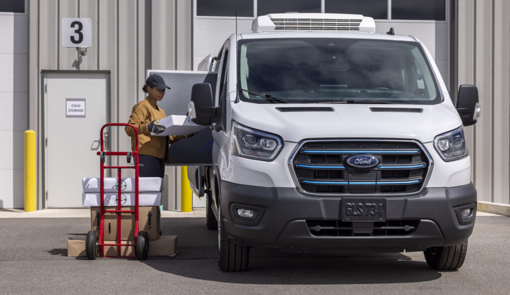 Woman loading the 2025 Ford E-Transit