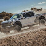 2025-Ford-F-150-Raptor-driving-through-rocky-terrain