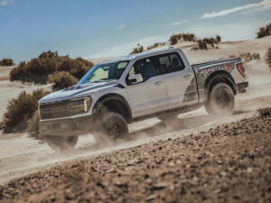 2025-Ford-F-150-Raptor-driving-through-rocky-terrain