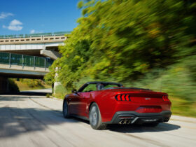 2024 Ford Mustang driving down road