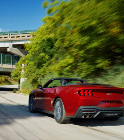 2024 Ford Mustang driving down road