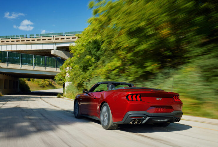 2024 Ford Mustang driving down road