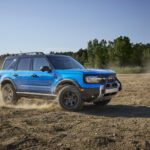 The All-new 2025 Bronco Sport driving in dirt