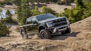 2025 Ford Green Raptor in sand