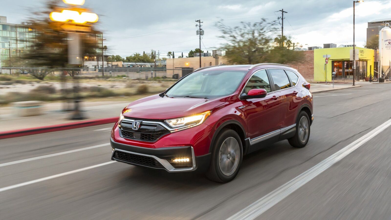 2021 honda cr v hybrid driving front quarter 2 Comprehensive Guide to Recognizing Hybrid Battery Failure Symptoms and Estimating Replacement Costs