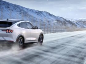 2025 Ford Mustang Mach E driving in the snow