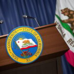 bigstock Press conference of governor o 415062364 Exploring California's Electric Vehicle Mandate: Feasibility, Economic Implications and Way Forward