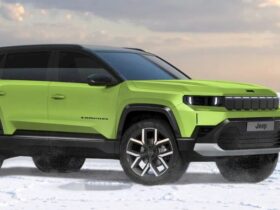 Bright green Jeep Compass EV parked on a snowy landscape, showcasing its modern design and electric SUV styling against a cloudy sky backdrop.